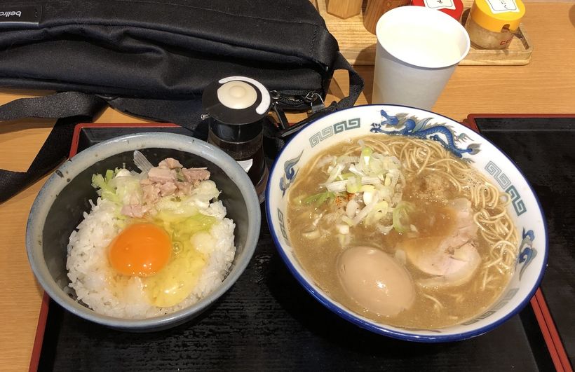 A bowl of ramen and a bowl of rice - tamago kake gohan.