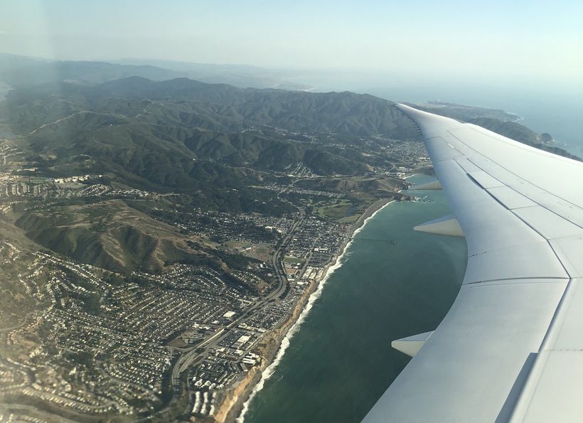 Looking out the window of a plane flying out of San Francisco.